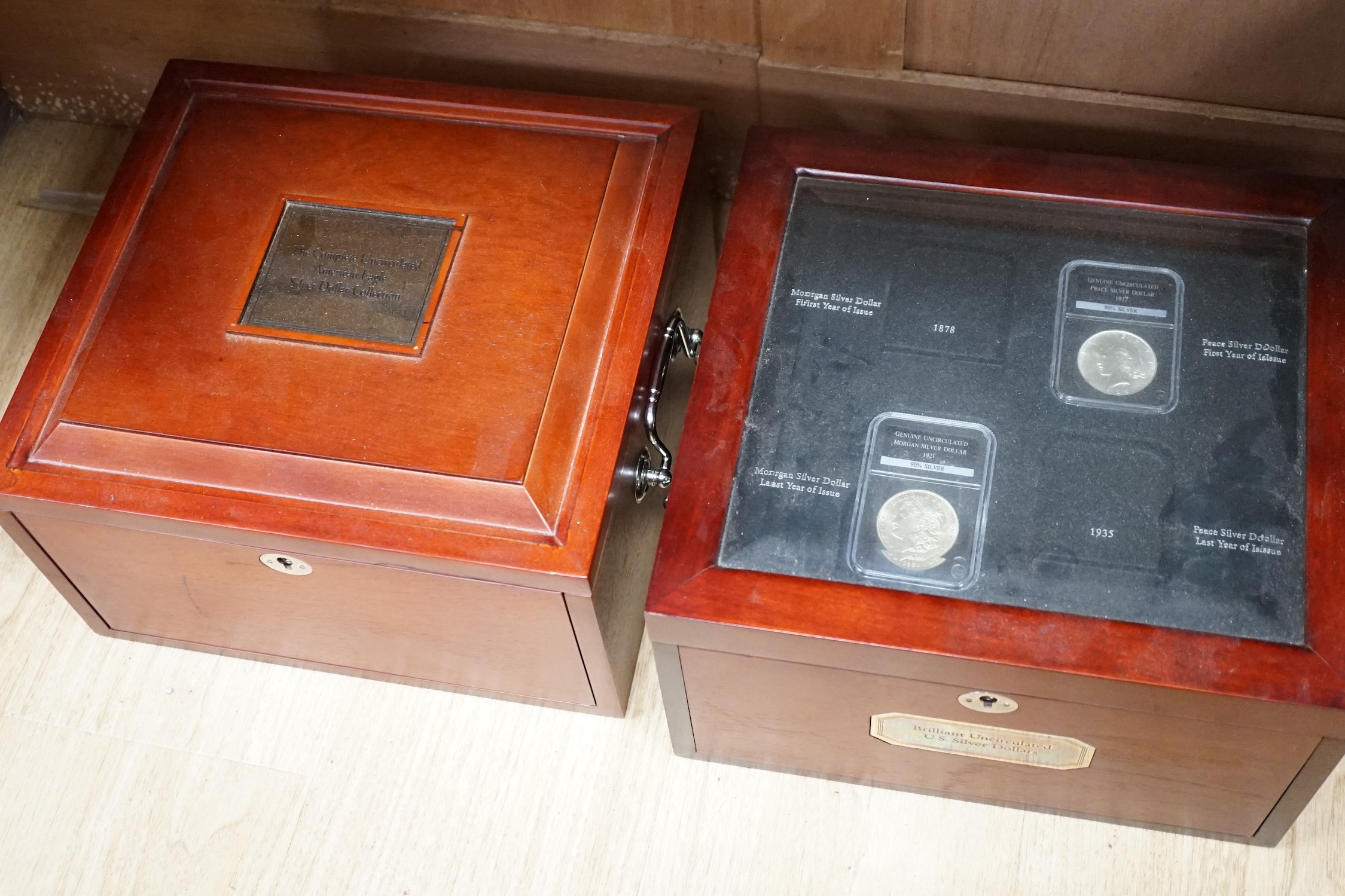 A group of incomplete collector's coin sets